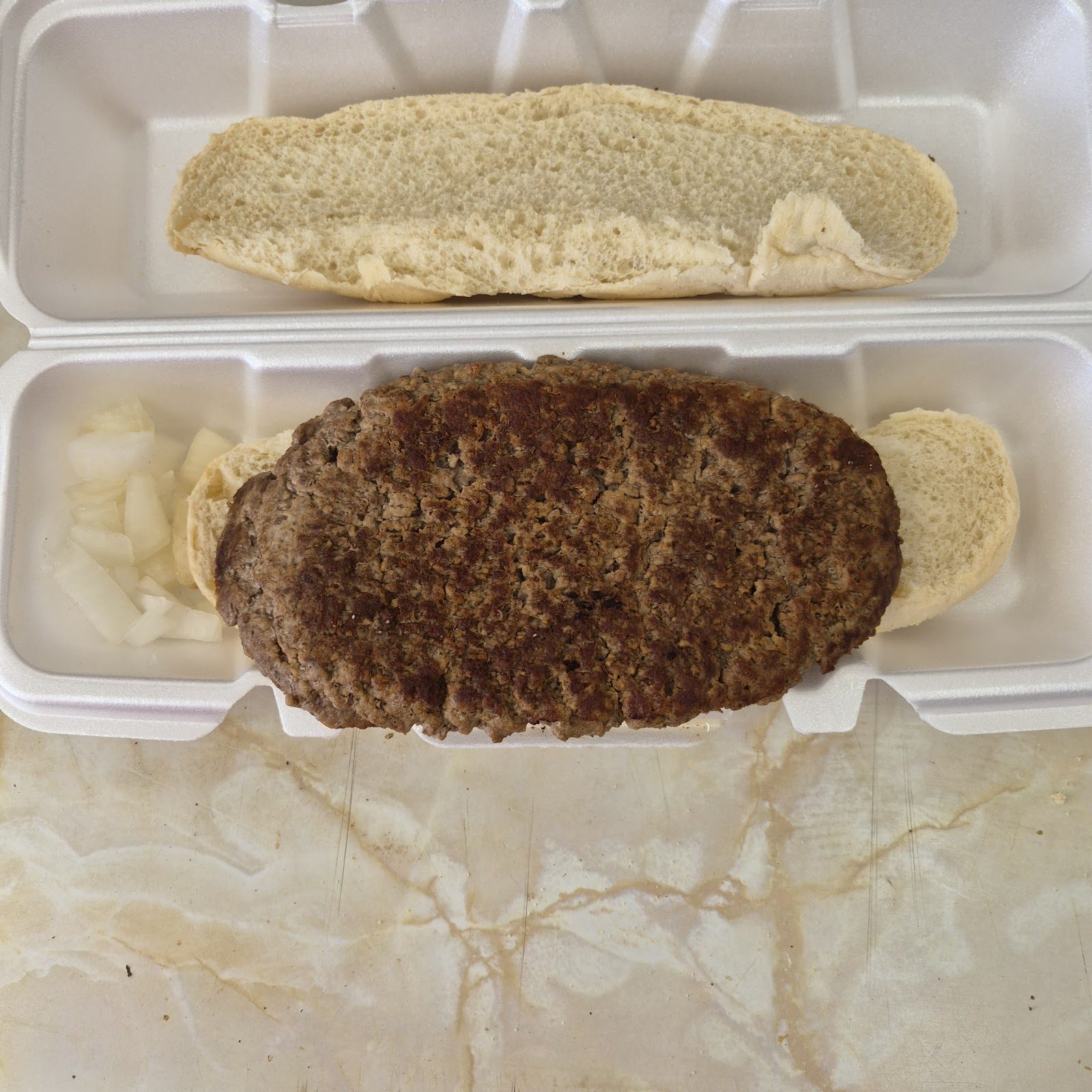 A meatloaf sandwich in a takeout box from North Benton Dairy Bar